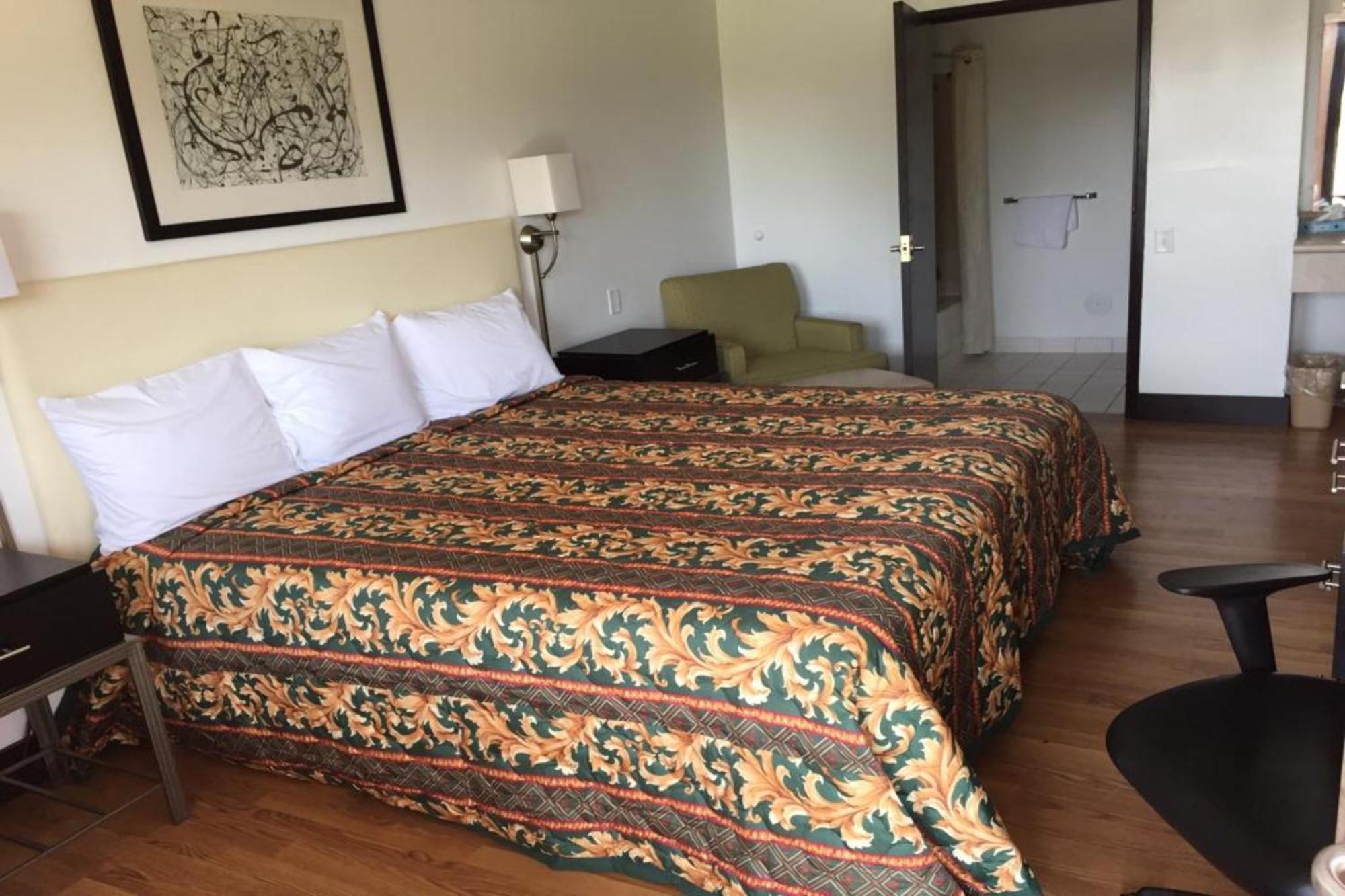 Economy Inn Of Холланд Экстерьер фото